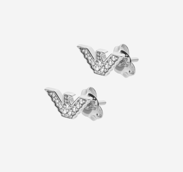 Gold Michael Kors earrings.